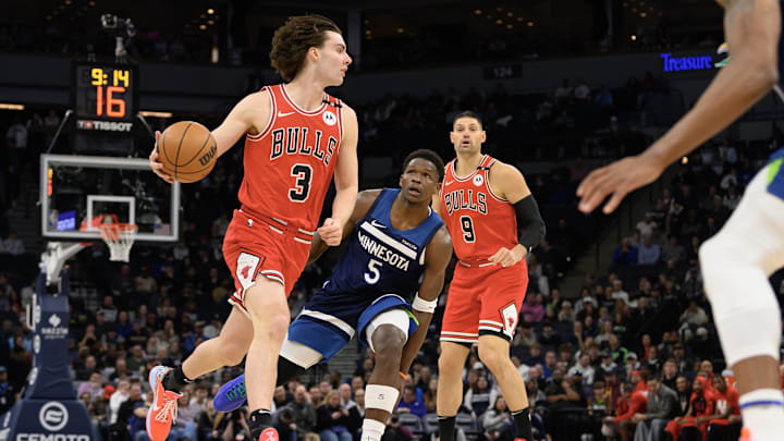 Chicago Bulls guard Josh Giddey controls the ball as Minnesota Timberwolves guard Anthony Edwards (5) gives chase during the first quarter at Target Center in Minneapolis on Feb. 5, 2025. Chicago Bulls guard Josh Giddey controls the ball as Minnesota Timberwolves guard Anthony Edwards (5) gives chase during the first quarter at Target Center in Minneapolis on Feb. 5, 2025.