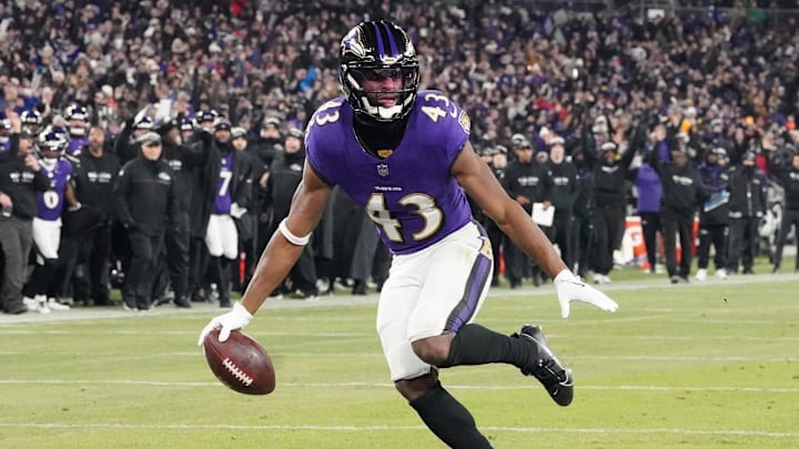 Baltimore Ravens running back Justice Hill scores a touchdown against the Pittsburgh Steelers. Baltimore Ravens running back Justice Hill scores a touchdown against the Pittsburgh Steelers.