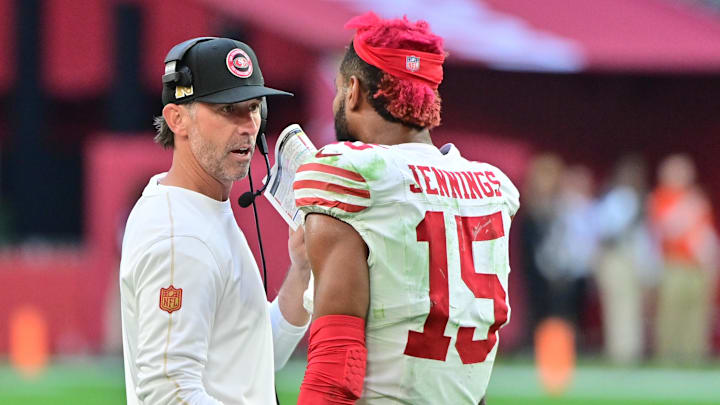 Jan 5, 2025; Glendale, Arizona, USA; San Francisco 49ers wide receiver Jauan Jennings (15) talks with head coach Kyle Shanahan after being ejected in the first half against the Arizona Cardinals at State Farm Stadium. Mandatory Credit: Matt Kartozian-Imagn Images