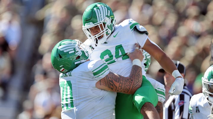 Sep 20, 2025; West Point, New York, USA; North Texas Mean Green running back Caleb Hawkins (24) celebrates his touchdown against the Army Black Knights during the second half at Michie Stadium. Mandatory Credit: Danny Wild-Imagn Images