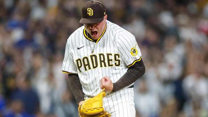 Jun 9, 2025; San Diego, California, USA; San Diego Padres relief pitcher Adrian Morejon (50) celebrates during the eighth inning against the Los Angeles Dodgers at Petco Park. Mandatory Credit: David Frerker-Imagn Images Jun 9, 2025; San Diego, California, USA; San Diego Padres relief pitcher Adrian Morejon (50) celebrates during the eighth inning against the Los Angeles Dodgers at Petco Park. Mandatory Credit: David Frerker-Imagn Images