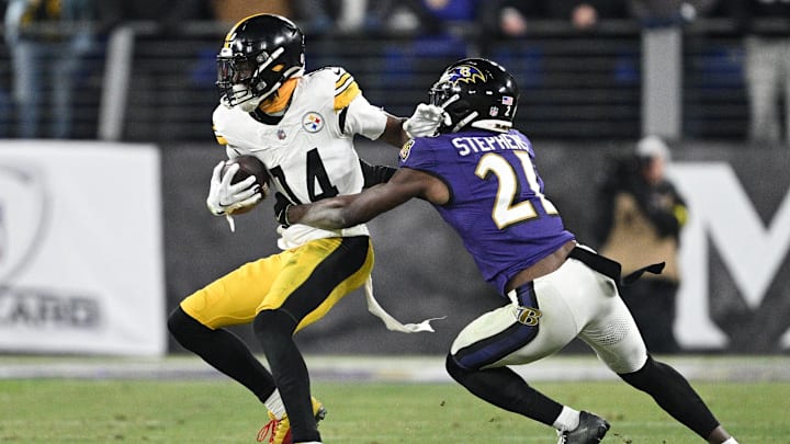  Pittsburgh Steelers wide receiver George Pickens runs against Baltimore Ravens cornerback Brandon Stephens in the fourth quarter in an AFC wild card game at M&T Bank Stadium. 