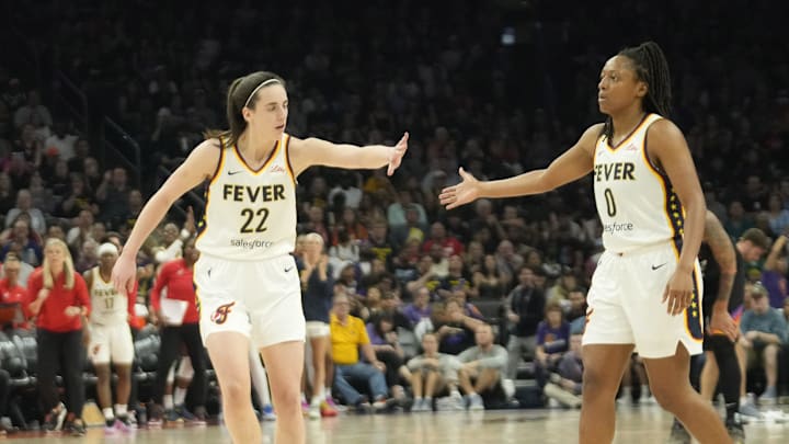 Caitlin Clark and Kelsey Mitchell during the 2024 season.