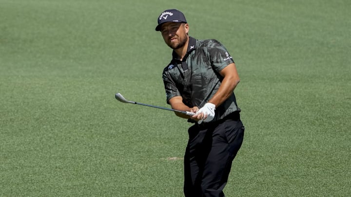 Apr 8, 2025; Augusta, Georgia, USA; Xander Schauffele hits onto the no. 2 green during a practice round for the Masters Tournament at Augusta National Golf Club. 