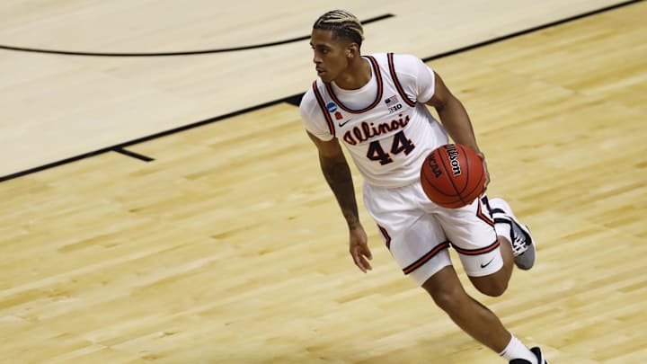 Mar 19, 2021; Indianapolis, Indiana, USA;  Illinois Fighting Illini guard Adam Miller (44) dribbles the ball against the Drexel Dragons during the first round of the 2021 NCAA Tournament at Indiana Farmers Coliseum. Mandatory Credit: Aaron Doster-Imagn Images