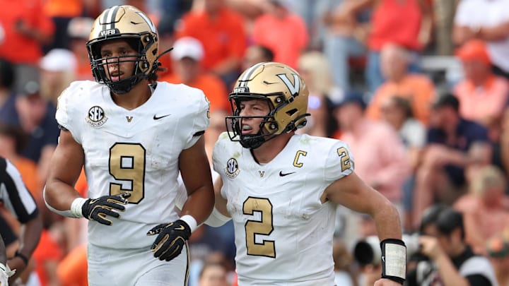 Nov 2, 2024; Auburn, Alabama, USA;  Vanderbilt Commodores quarterback Diego Pavia (2) celebrates with tight end Eli Stowers (9) after a touchdown during the fourth quarter against the Auburn Tigers at Jordan-Hare Stadium. Mandatory Credit: John Reed-Imagn Images