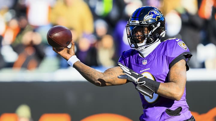 Dec 14, 2025; Cincinnati, Ohio, USA; Baltimore Ravens quarterback Lamar Jackson (8) throws a pass against the Cincinnati Bengals in the first half at Paycor Stadium. 