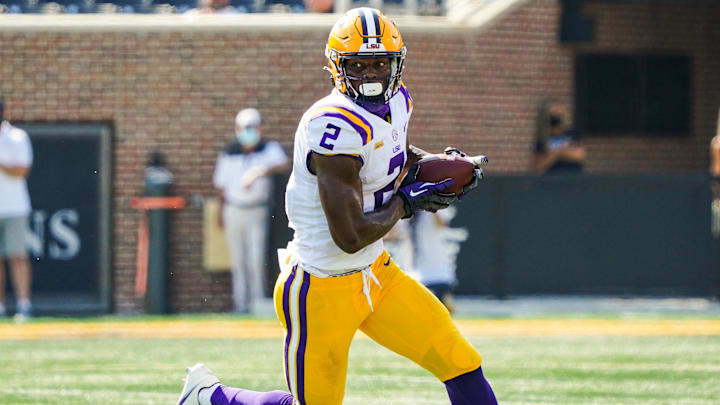Oct 10, 2020; Columbia, Missouri, USA; LSU Tigers tight end Arik Gilbert (2) runs against the Missouri Tigers during the first half at Faurot Field at Memorial Stadium. Mandatory Credit: Jay Biggerstaff-Imagn Images