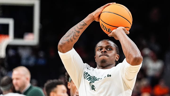 Michigan State forward Coen Carr (55) warms up before the tipoff of the Elite Eight round of NCAA tournament against Auburn at State Farm Arena in Atlanta, Ga. on Sunday, March 30, 2025.