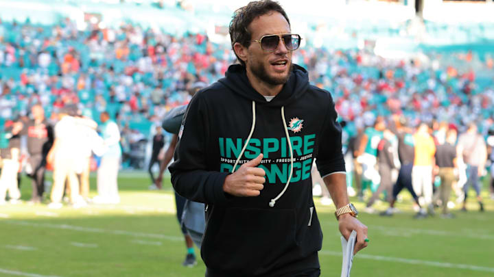 Miami Dolphins head coach Mike McDaniel runs off the field following a win over the Tampa Bay Buccaneers at Hard Rock Stadium. Mandatory Credit: Sam Navarro-Imagn Images