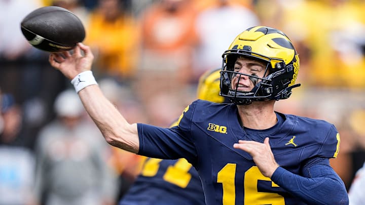 Michigan quarterback Davis Warren (16) makes a pass against Texas during the second half at Michigan Stadium in Ann Arbor on Saturday, September 7, 2024.