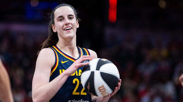 Jun 17, 2025; Indianapolis, Indiana, USA; Indiana Fever guard Caitlin Clark (22) in the first half against the Connecticut Sun at Gainbridge Fieldhouse. Mandatory Credit: Trevor Ruszkowski-Imagn Images