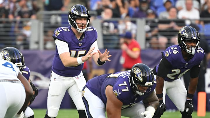 Aug 7, 2025; Baltimore, Maryland, USA; Baltimore Ravens quarterback Cooper Rush (15) awaits the snap against the Indianapolis Colts during the first quarter at M&T Bank Stadium. Mandatory Credit: Rafael Suanes-Imagn Images