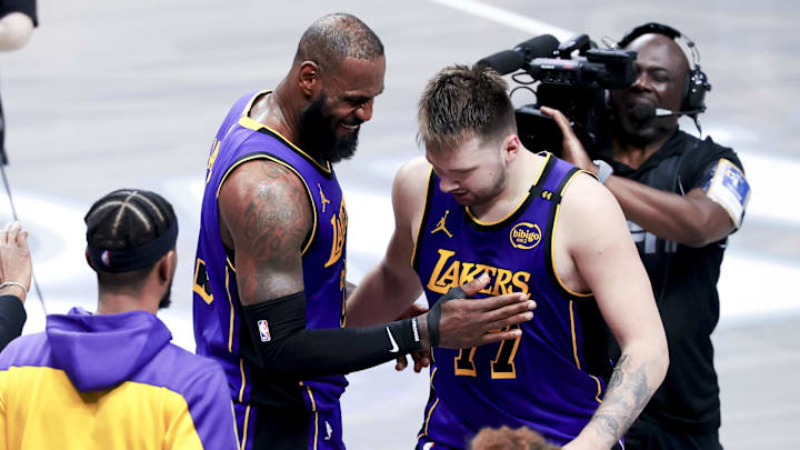 Apr 9, 2025; Dallas, Texas, USA: Los Angeles Lakers forward LeBron James (23) celebrates with Los Angeles Lakers guard Luka Doncic (77) during the fourth quarter against the Dallas Mavericks at American Airlines Center. Mandatory Credit: Kevin Jairaj-Imagn Images