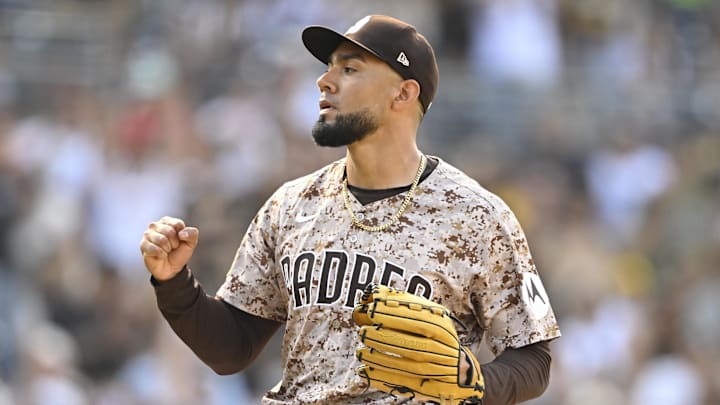 Sep 14, 2025; San Diego, California, USA; San Diego Padres relief pitcher Robert Suarez (75) pumps his fist after the Padres beat the Colorado Rockies at Petco Park. Mandatory Credit: Denis Poroy-Imagn Images Sep 14, 2025; San Diego, California, USA; San Diego Padres relief pitcher Robert Suarez (75) pumps his fist after the Padres beat the Colorado Rockies at Petco Park. Mandatory Credit: Denis Poroy-Imagn Images