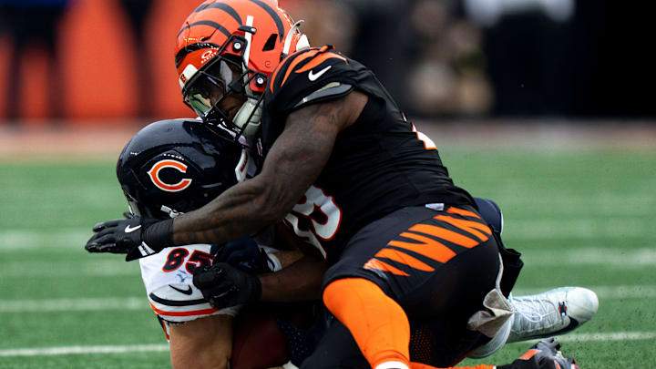 Cincinnati Bengals linebacker Barrett Carter puts a hit on Bears tight end Cole Kmet in the second quarter Sunday.