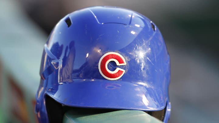 Sep 14, 2013; Pittsburgh, PA, USA; Chicago Cubs batting helmet sits on the dugout rail before the Cubs play the Pittsburgh Pirates at PNC Park. Mandatory Credit: Charles LeClaire-Imagn Images Sep 14, 2013; Pittsburgh, PA, USA; Chicago Cubs batting helmet sits on the dugout rail before the Cubs play the Pittsburgh Pirates at PNC Park. Mandatory Credit: Charles LeClaire-Imagn Images