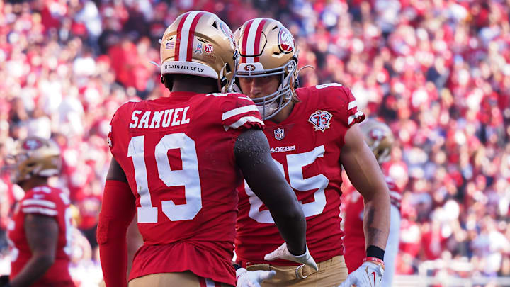 Nov 28, 2021; Santa Clara, California, USA; San Francisco 49ers wide receiver Deebo Samuel (19) celebrates with tight end George Kittle (85) after scoring a touchdown against the Minnesota Vikings during the first quarter at Levi's Stadium. Mandatory Credit: Kelley L Cox-Imagn Images