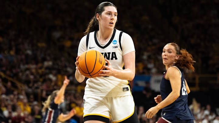 Iowa center Ava Heiden (5) grabs the basketball March 21, 2026 during a First Round NCAA March Madness game against the Fairleigh Dickinson Knights at Carver-Hawkeye Arena in Iowa City, Iowa.
