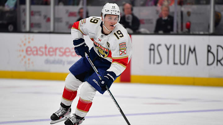 Jan 21, 2025; Anaheim, California, USA; Florida Panthers left wing Matthew Tkachuk (19) controls the puck against the Anaheim Ducks during the third period at Honda Center. Mandatory Credit: Gary A. Vasquez-Imagn Images