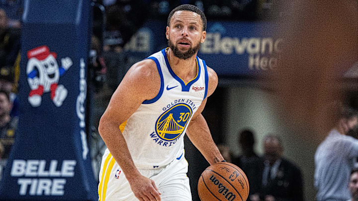 Nov 1, 2025; Indianapolis, Indiana, USA: Golden State Warriors guard Stephen Curry (30) dribbles the ball in the first half against the Indiana Pacers  at Gainbridge Fieldhouse. Mandatory Credit: Trevor Ruszkowski-Imagn Images