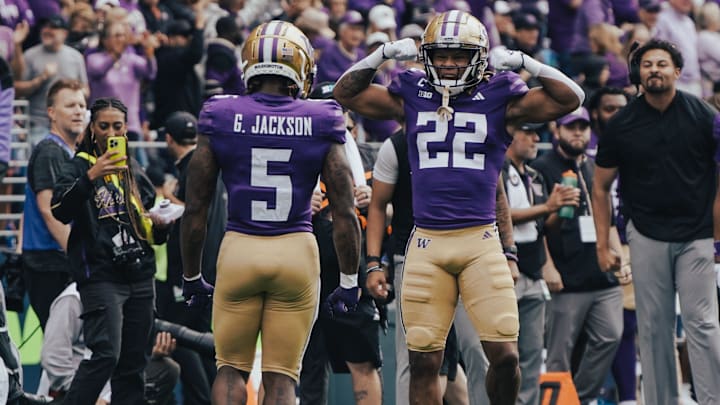Cam Davis flexes for Giles Jackson's benefit on game day. Cam Davis flexes for Giles Jackson's benefit on game day.