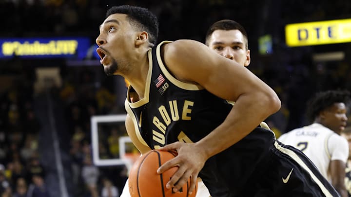 Purdue Boilermakers forward Trey Kaufman-Renn (4) dribbles against the Michigan Wolverines.