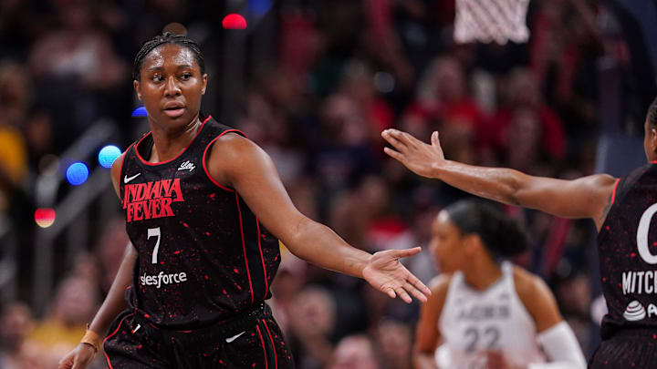 Indiana Fever forward Aliyah Boston (7) high-fives Indiana Fever guard Kelsey Mitchell (0) on Thursday, July 24, 2025, during the game at Gainbridge Fieldhouse in Indianapolis. Indiana Fever forward Aliyah Boston (7) high-fives Indiana Fever guard Kelsey Mitchell (0) on Thursday, July 24, 2025, during the game at Gainbridge Fieldhouse in Indianapolis.