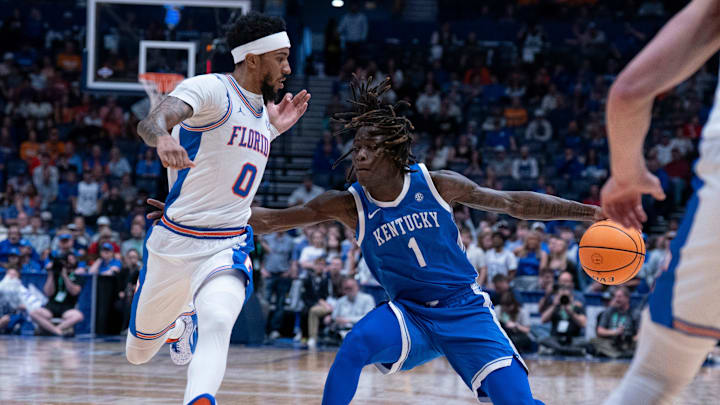 Florida guard Boogie Fland (0) guards Kentucky guard Denzel Aberdeen (1) during their quarterfinal game of the 2026 SEC Men’s Basketball Tournament at Bridgestone Arena in Nashville, Tenn., Friday, March 13, 2026. Florida guard Boogie Fland (0) guards Kentucky guard Denzel Aberdeen (1) during their quarterfinal game of the 2026 SEC Men’s Basketball Tournament at Bridgestone Arena in Nashville, Tenn., Friday, March 13, 2026.