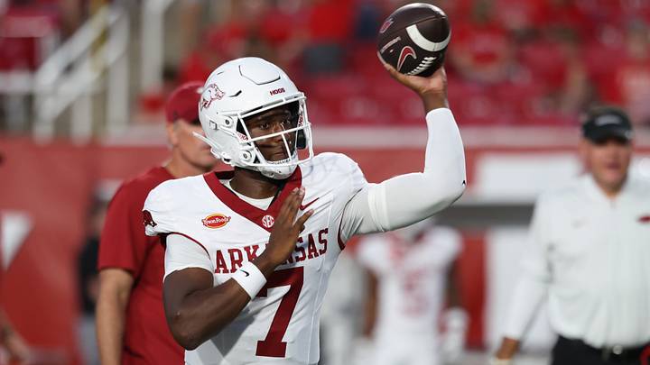 Arkansas Razorbacks quarterback KJ Jackson (7) warms up before a game against the Utah Utes at Rice-Eccles Stadium. Arkansas Razorbacks quarterback KJ Jackson (7) warms up before a game against the Utah Utes at Rice-Eccles Stadium.