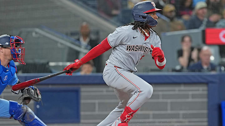 Apr 2, 2025; Toronto, Ontario, CAN; Washington Nationals shortstop CJ Abrams (5) hits a ground out against the Toronto Blue Jays during the eighth inning at Rogers Centre.