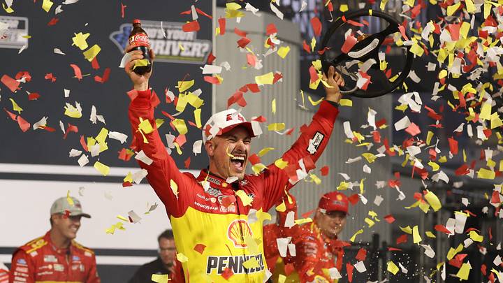 Aug 15, 2026; Richmond, Virginia, USA; Team Penske driver Joey Logano (22) celebrates the win in the Cook Out 400 at Richmond Raceway.