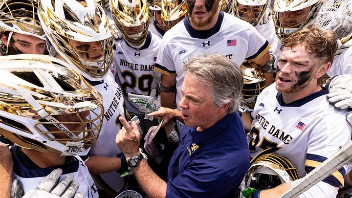 May 25, 2024; Philadelphia, PA, USA; Notre Dame head coach Kevin Corrigan talks with his team after a semifinal victory against Denver at Lincoln Financial. 