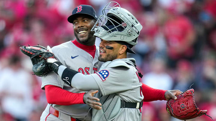 Boston Red Sox pitcher Aroldis Chapman (44) and catcher Carlos Narváez (75) celebrate a win after the ninth inning of the MLB Opening Day game between the Cincinnati Reds and the Boston Red Sox at Great American Ball Park in downtown Cincinnati on Thursday, March 26, 2026. The Reds lost the season opener, 3-0. Boston Red Sox pitcher Aroldis Chapman (44) and catcher Carlos Narváez (75) celebrate a win after the ninth inning of the MLB Opening Day game between the Cincinnati Reds and the Boston Red Sox at Great American Ball Park in downtown Cincinnati on Thursday, March 26, 2026. The Reds lost the season opener, 3-0.