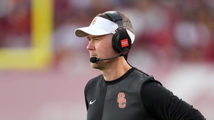 Aug 30, 2025; Los Angeles, California, USA; Southern California Trojans head coach Lincoln Riley watches from the sidelines against the Missouri State Bears in the first half at United Airlines Field at Los Angeles Memorial Coliseum. Mandatory Credit: Kirby Lee-Imagn Images
