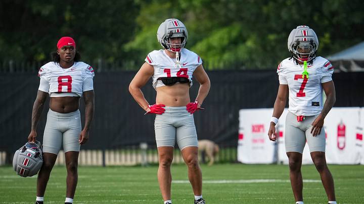 Ohio State Buckeyes safety Jaylen McClain (8), linebacker Christian Alliegro (14) and cornerback Jermaine Mathews Jr. (7) line up during the first practice of training camp at the Woody Hayes Athletic Center in Columbus on Aug. 6, 2026.