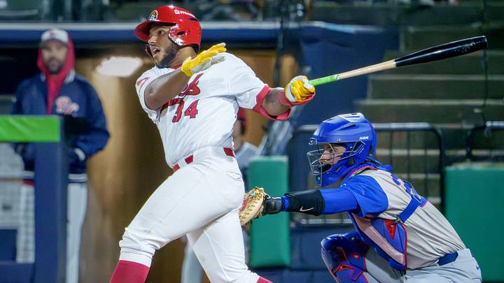 Peoria catcher Rainiel Rodriguez watches his hit leave the infield for a base hit against South Bend during the Chiefs' home opener Tuesday, April 7, 2026, at Dozer Park. The Chiefs routed the Cubs 10-1. Peoria catcher Rainiel Rodriguez watches his hit leave the infield for a base hit against South Bend during the Chiefs' home opener Tuesday, April 7, 2026, at Dozer Park. The Chiefs routed the Cubs 10-1.