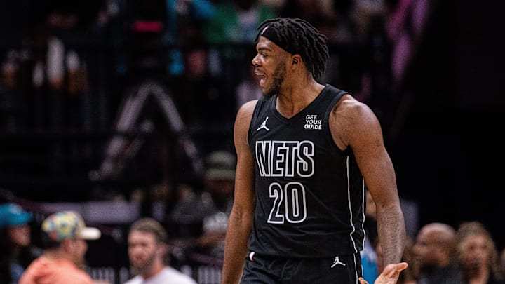 Mar 8, 2025; Charlotte, North Carolina, USA; Brooklyn Nets center Day'Ron Sharpe (20) argues for a foul during the third quarter against the Charlotte Hornets at Spectrum Center. Mandatory Credit: Scott Kinser-Imagn Images