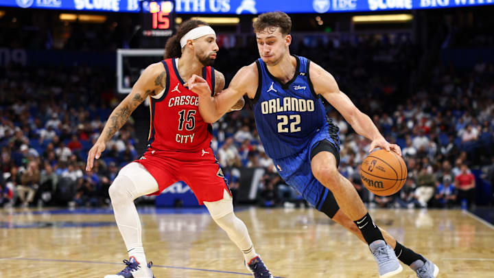 Orlando Magic forward Franz Wagner (22) drives the ball past New Orleans Pelicans guard Jose Alvarado (15) in the second quarter at Kia Center.