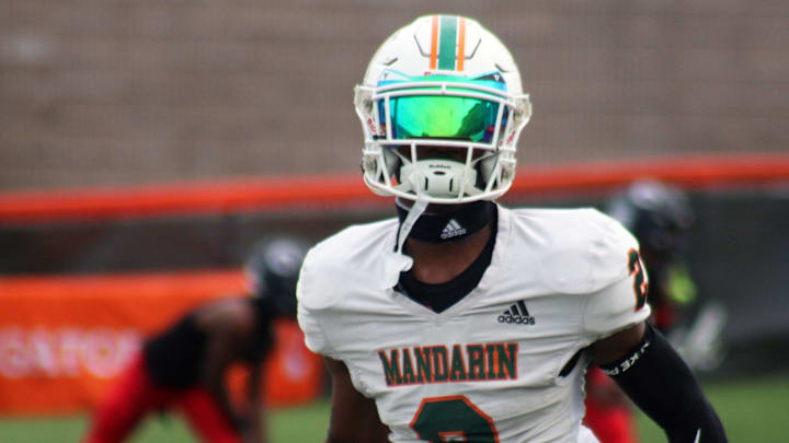 Mandarin wide receiver Jaime Ffrench Jr. (2) runs through warm-ups before the FHSAA Class 4M high