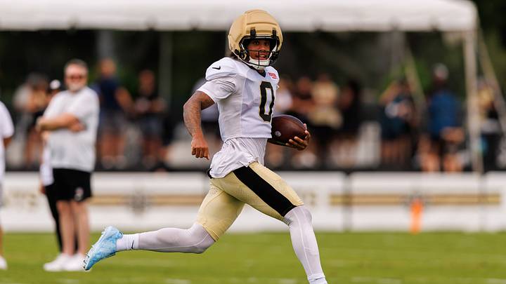 New Orleans Saints wide receiver Jordyn Tyson (0) catches a pass against linebacker Kaden Elliss (55) during training camp at Ochsner Sports Performance Center. New Orleans Saints wide receiver Jordyn Tyson (0) catches a pass against linebacker Kaden Elliss (55) during training camp at Ochsner Sports Performance Center.