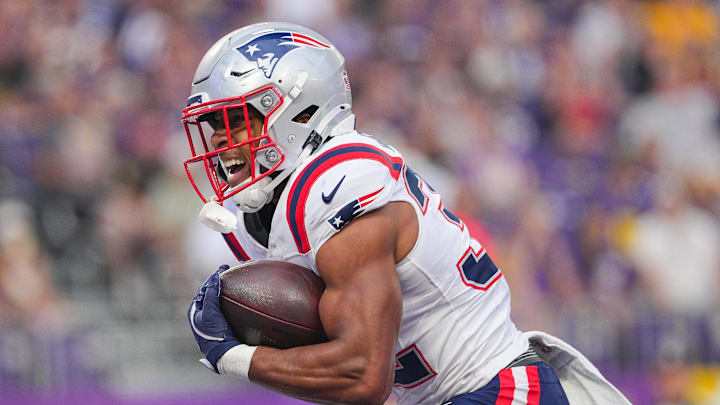 Aug 16, 2025; Minneapolis, Minnesota, USA; New England Patriots running back TreVeyon Henderson (32) celebrates his touchdown against the Minnesota Vikings in the first quarter at U.S. Bank Stadium. Mandatory Credit: Brad Rempel-Imagn Images