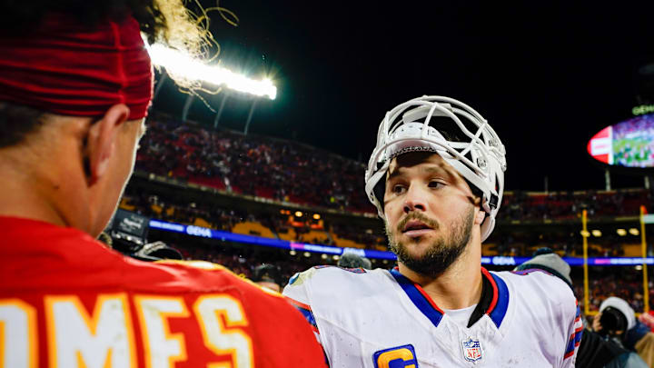 Dec 10, 2023; Kansas City, Missouri, USA; Buffalo Bills quarterback Josh Allen (17) talks with Kansas City Chiefs quarterback Patrick Mahomes (15) after a game  at GEHA Field at Arrowhead Stadium. Mandatory Credit: Jay Biggerstaff-Imagn Images