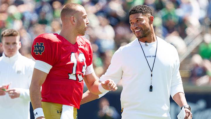 Notre Dame quarterback CJ Carr (13) and head coach Marcus Freeman during the Blue-Gold spring game at Notre Dame Stadium on Saturday, April 25, 2026, in South Bend.