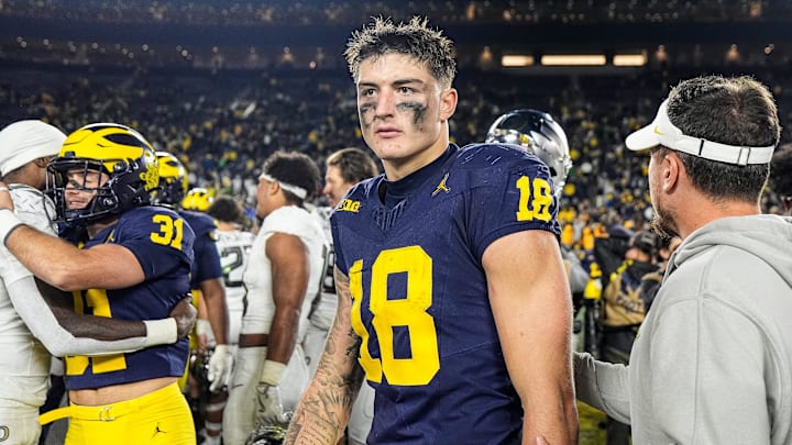 Michigan tight end Colston Loveland (18) walks off the field after 38-17 loss to Oregon at Michigan Stadium in Ann Arbor on Saturday, Nov. 2, 2024.