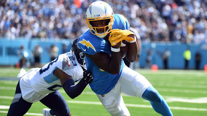 Los Angeles Chargers wide receiver Mike Williams runs after a catch against Tennessee Titans cornerback Tre Avery