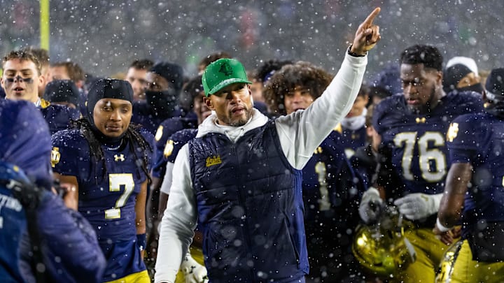 Nov 8, 2025; South Bend, Indiana, USA; Notre Dame Fighting Irish head coach Marcus Freeman points to the crowd after the second half against the Navy Midshipmen at Notre Dame Stadium. Mandatory Credit: Michael Caterina-Imagn Images
