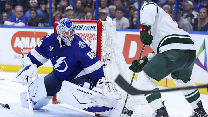 Mar 24, 2026; Tampa, Florida, USA; Tampa Bay Lightning goaltender Andrei Vasilevskiy (88) blocks a shot against the Minnesota Wild in the second period at Benchmark International Arena. Mandatory Credit: Nathan Ray Seebeck-Imagn Images Mar 24, 2026; Tampa, Florida, USA; Tampa Bay Lightning goaltender Andrei Vasilevskiy (88) blocks a shot against the Minnesota Wild in the second period at Benchmark International Arena. Mandatory Credit: Nathan Ray Seebeck-Imagn Images