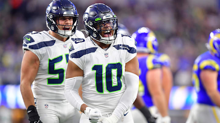 Dec 4, 2022; Inglewood, California, USA; Seattle Seahawks linebacker Uchenna Nwosu (10) and linebacker Cody Barton (57) react against the Los Angeles Rams during the second half at SoFi Stadium. Mandatory Credit: Gary A. Vasquez-Imagn Images