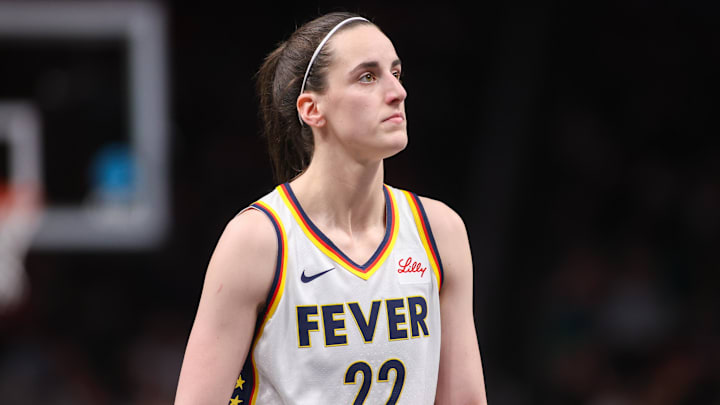 May 22, 2025; Atlanta, Georgia, USA; Indiana Fever guard Caitlin Clark (22) in action against the Atlanta Dream in the first half at State Farm Arena. Mandatory Credit: Brett Davis-Imagn Images